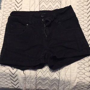 black shorts.